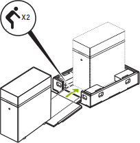 Line drawing showing the DGX Station being rolled into the bottom tray of its shipping carton.